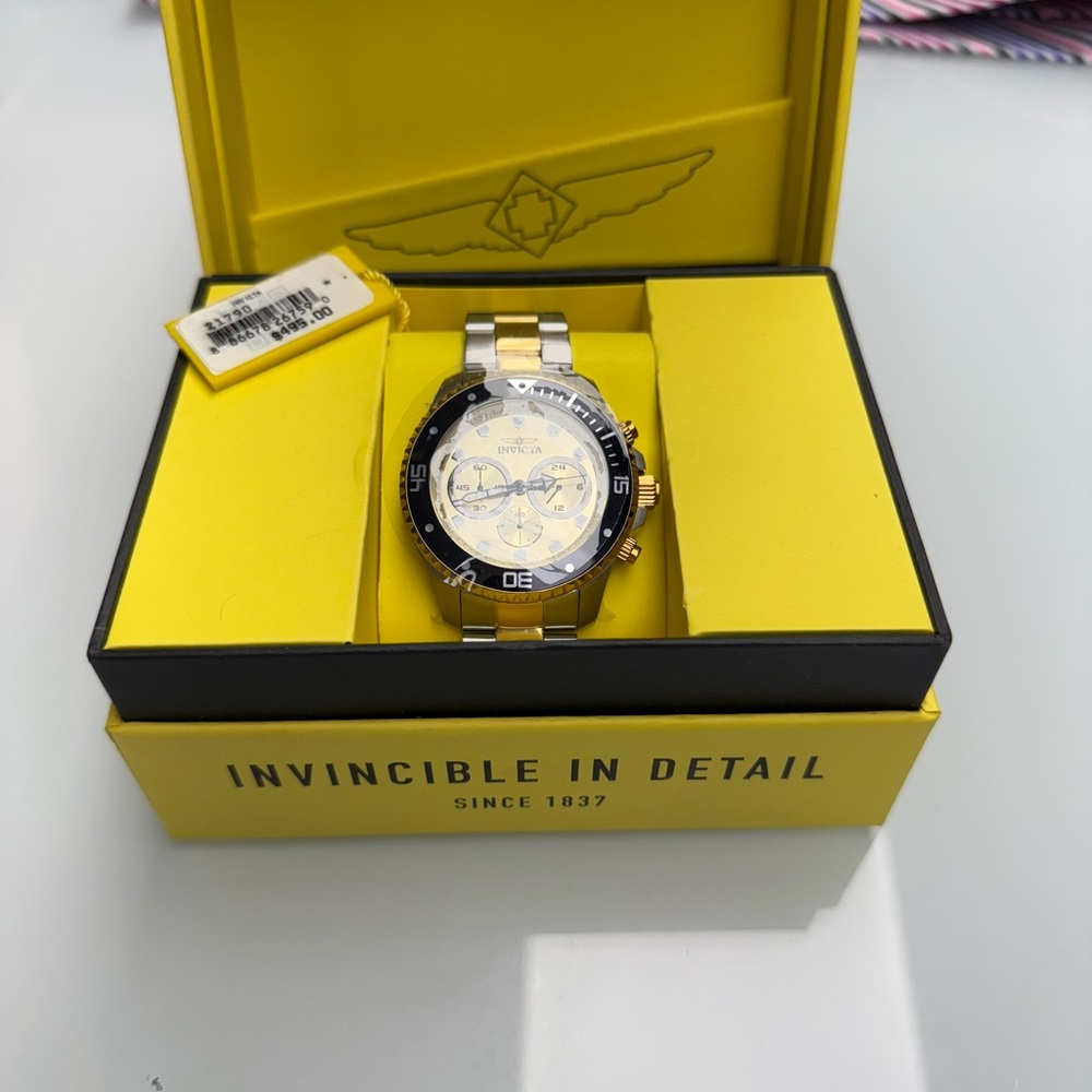 Invicta Silver and Gold Chronograph Watch